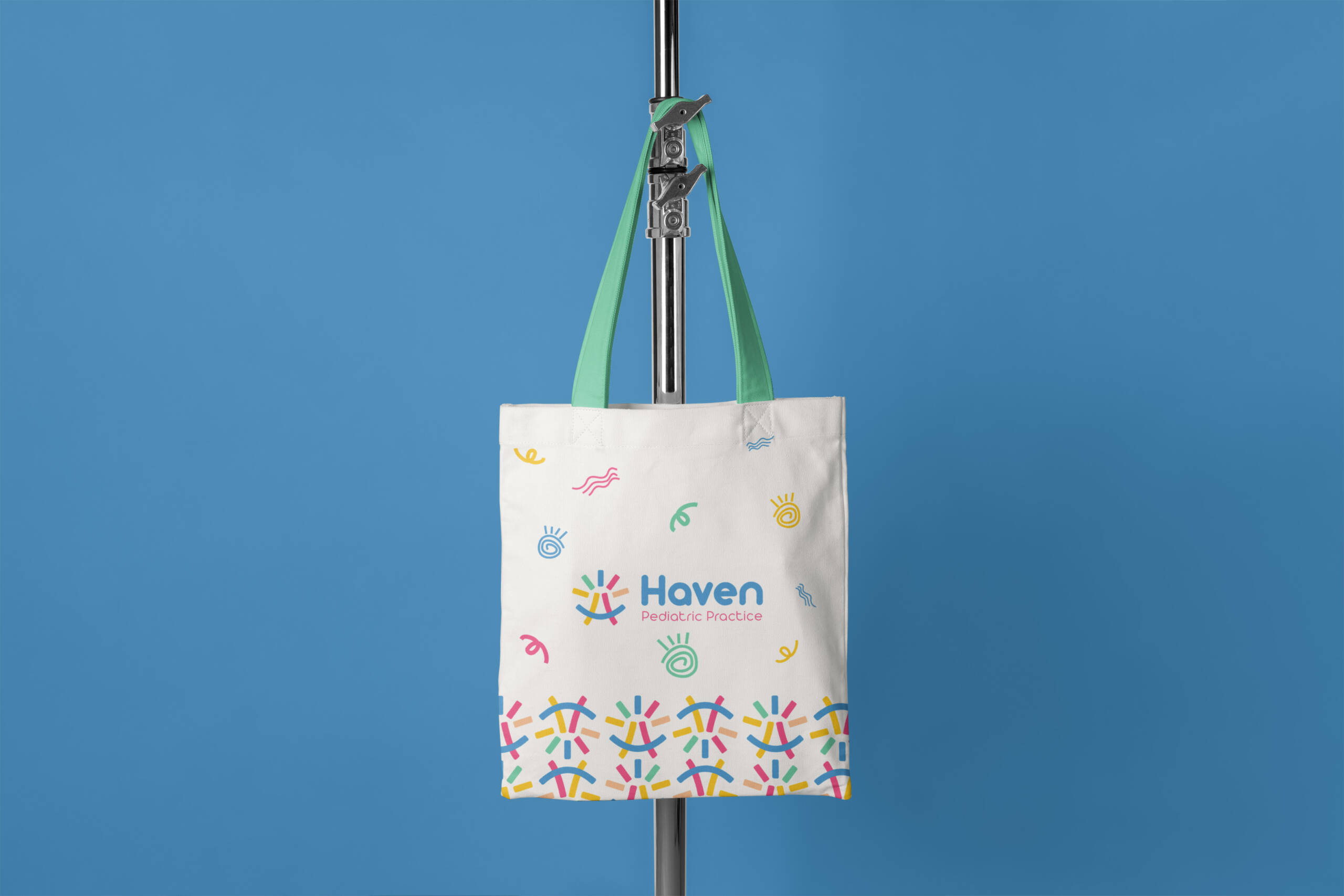 Free Canvas Bag Hanging on Tripod Mockup